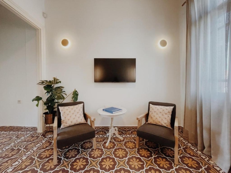 Wohnzimmer, Stühle, Fernseher, Wandleuchten, Dekorative Fliesen, Kale Kapi City in Xania